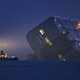 Illustration for article titled These Photos Of That Grounded Car Carrier Ship Are Beautifully Surreal